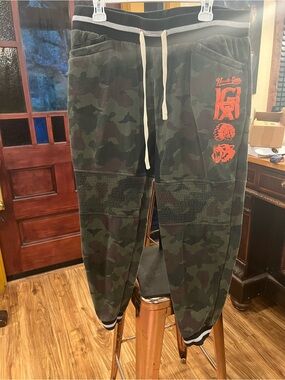Hustle Gang Camo Green Joggers with Orange Logo
